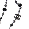 Long sautoir CHANEL en perles velours , acier et noires