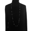 Long sautoir CHANEL en perles velours , acier et noires