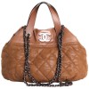 Sac pochon CHANEL cuir gold brillant