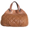 Sac pochon CHANEL cuir gold brillant