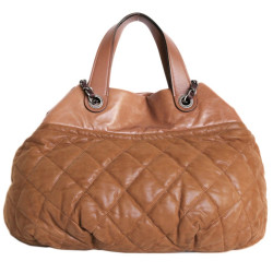 Sac  pochon CHANEL cuir gold brillant