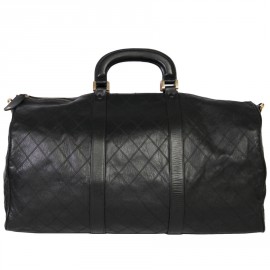 Weekender CHANEL black quilted leather bag