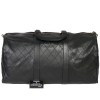 Sac weekender CHANEL en cuir matelassé noir