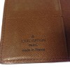 LOUIS VUITTON wallet large format in coated canvas