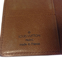 Portefeuille LOUIS VUITTON grand format en toile enduite