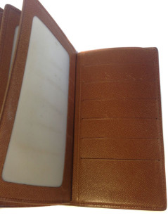 LOUIS VUITTON wallet large format in coated canvas