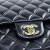 Quilted CHANEL timeless black lambskin bag