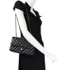 Quilted CHANEL timeless black lambskin bag