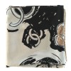 Foulard CHANEL "Paris" en soie beige et noir