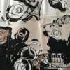 CHANEL "Paris" beige and black silk scarf