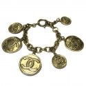 Bracelet CHANEL pièces en métal doré or très pâle