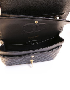 Timeless CHANEL black caviar leather bag