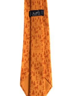 HERMÈS tie in orange silk scarf