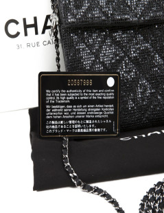 CHANEL quilted shiny black leather pouch