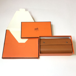 cahier roulé  HERMES cuir buffle gold avec 2 recharges