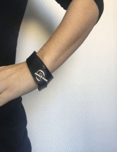 HERMES bracelet in black leather and sterling silver buckle