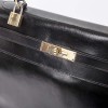 Kelly 35 en cuir box noir Vintage