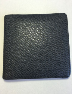 Multiple LOUIS VUITTON taiga leather wallet