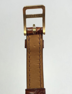 HERMES Kelly watch alligator and gold hardware