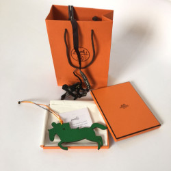 Charm. horse and jockey in two-tone green and brown leather HERMES