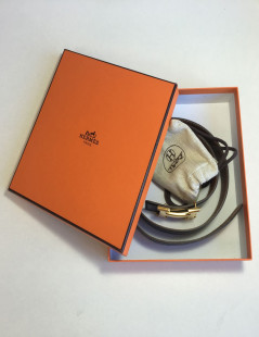 xxx Ceinture HERMES T 85 réversible en cuir box noir et cuir togo gold