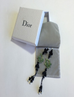 Collector DIOR clip-on earrings in fine black cord and DIOR in silver plated metal and green resin