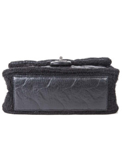 CHANEL flap bag in black wool and aged leather