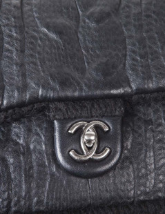 CHANEL flap bag in black wool and aged leather