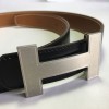 Ceinture HERMES T 75 réversible en cuir box noir et cuir grainé gold