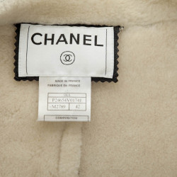 Veste CHANEL T 42 peau retournée noir interieur blanc