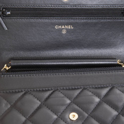 Mini black quilted lambskin CHANEL bag