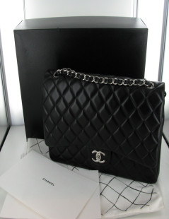 Lamb quilted black CHANEL Jumbo Maxi