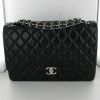 Maxi Jumbo agneau matelassé noir CHANEL