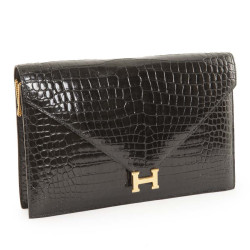 HERMÈS black porosus crocodile pouch bag