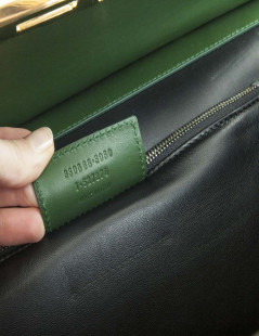 The ten BALENCIAGA green smooth leather bag