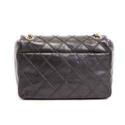 Sac Timeless CHANEL cuir d'agneau lisse matelassé noir