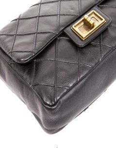 Sac Timeless CHANEL cuir d'agneau lisse matelassé noir