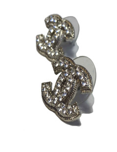 Boucles d'oreille clous CHANEL CC en métal argenté et strass