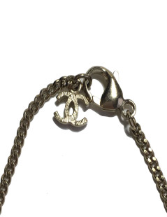 Collier CHANEL pendentif boule 