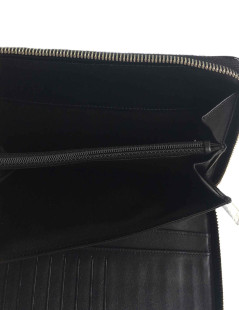 Portefeuille pochette CHANEL zippée en cuir verni noir matelassé