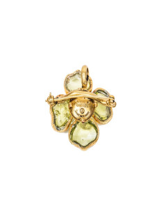 CHANEL camélia brooch in gilded metal and green molten glass