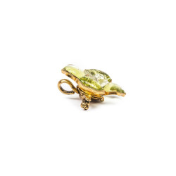 CHANEL camélia brooch in gilded metal and green molten glass