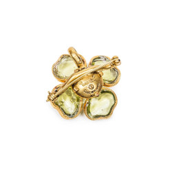 CHANEL camélia brooch in gilded metal and green molten glass