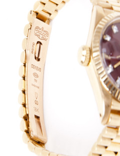 Montre ROLEX pour femme or jaune et diamants