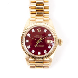 Montre ROLEX pour femme or jaune et diamants