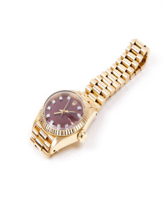 Montre ROLEX pour femme or jaune et diamants