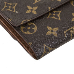 Porte monnaie LOUIS VUITTON en toile enduite monogram 