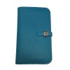 Portefeuille Dogon Duo HERMES grand modèle en veau swift turquoise