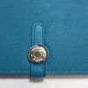 Portefeuille Dogon Duo HERMES grand modèle en veau swift turquoise