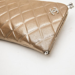 CHANEL evening clutch in gold lamé leather